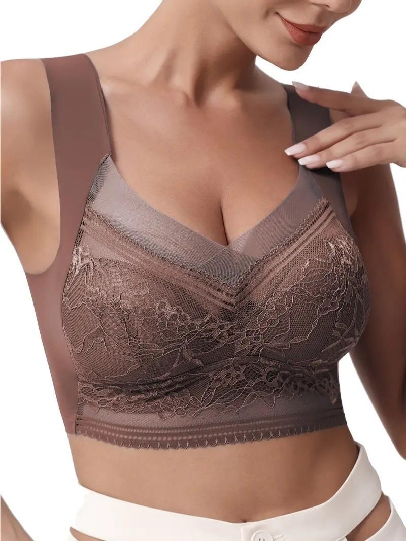 Woman wearing a brown lace bra, showcasing comfortable and elegant women's undergarment.