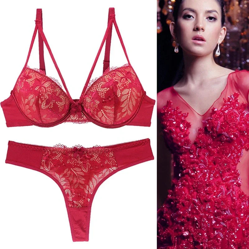 Red lace bra and panty set with floral details, designed for everyday comfort and elegance
