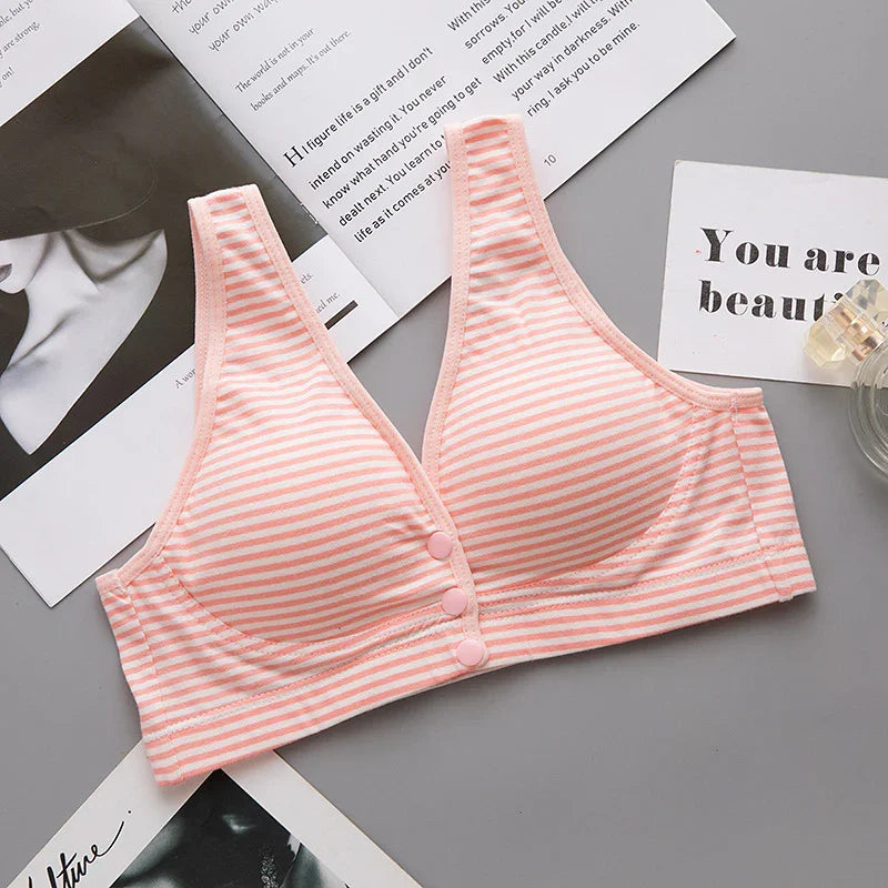 Soft pink and white striped wireless bra with front buttons, designed for everyday comfort and support.