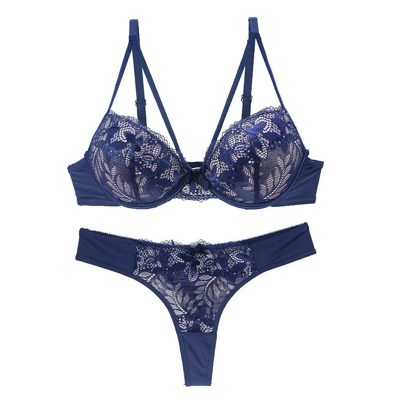 Navy blue lace bra and panty lingerie set for women, featuring elegant floral details.